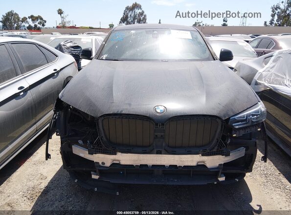 5UX33DT09N9H43641 2022 BMW X4 Black Вид задньої частини салону