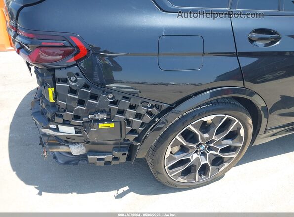 5UX33EM00S9W92706 2025 BMW X7 Черный 