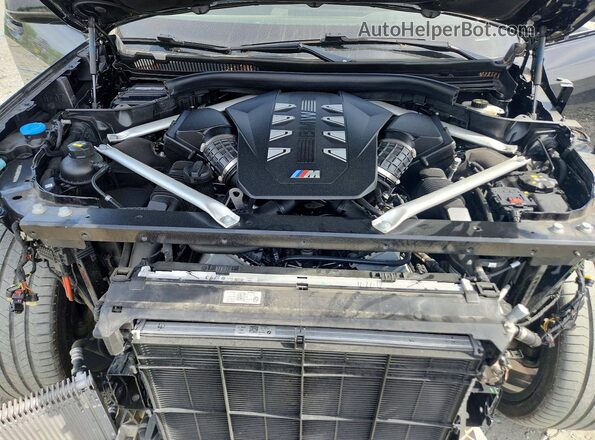 5UX33EM02P9R10717 2023 BMW X7 Black ძრავის განყოფილების ხედი