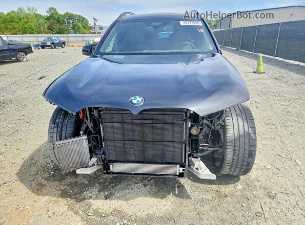 5UX33EM02P9R10717 2023 BMW X7 Black წინა ხედი