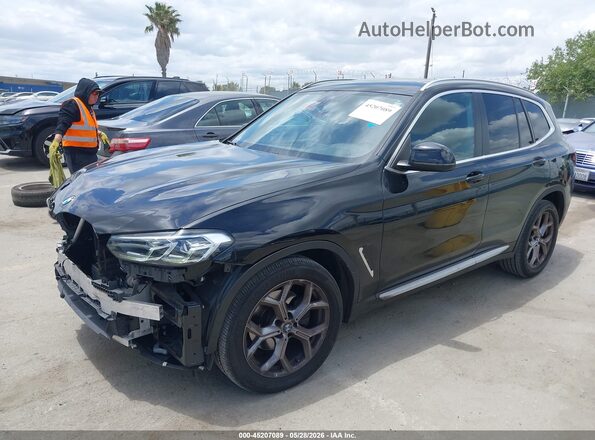 5UX43DP02N9K07710 2022 BMW X3 Black Առջևի ձախ երեք քառորդ տեսարան