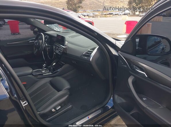 5UX43DT03P9P77661 2023 BMW X4 Black Vista interior delantera