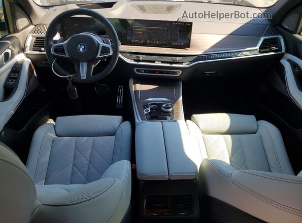 5UX43EU09S9Y89488 2025 BMW X5 Серый Вид панели приборов