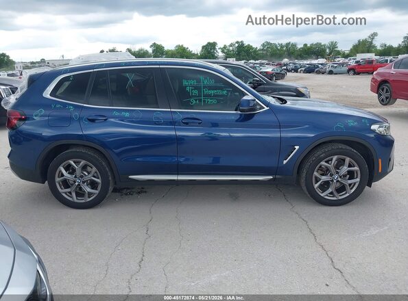 5UX53DP01R9V84281 2024 BMW X3 Blue Вид задньої частини салону
