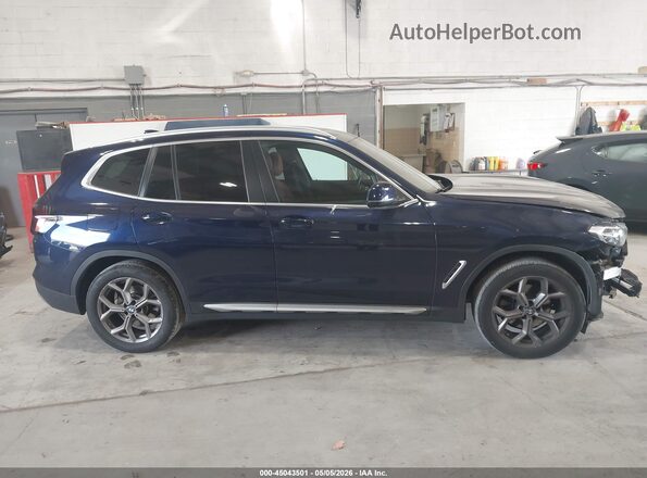 5UX53DP07P9P84787 2023 BMW X3 Dark Blue Rear interior view