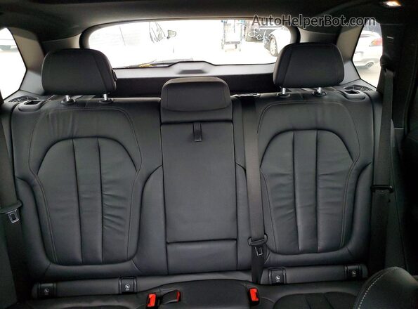 5UXCR6C55KLL35705 2019 BMW X5 Charcoal Vista de los asientos traseros