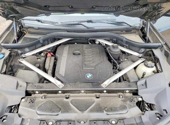 5UXCW2C00L9C34420 2020 BMW X7 Black Vista del compartimento del motor