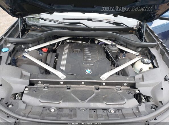 5UXCW2C09N9K63687 2022 BMW X7 Blue Rear view