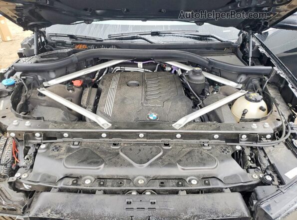 5UXCW2C0XM9D83242 2021 BMW X7 Black Շարժիչի բաժամունքի տեսք