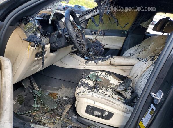 5UXCY6C02L9C74631 2020 BMW X6 Black Vista interior delantera