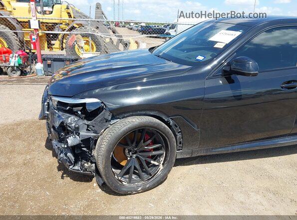 5UXCY6C02N9M28402 2022 BMW X6 Black Widok z przodu