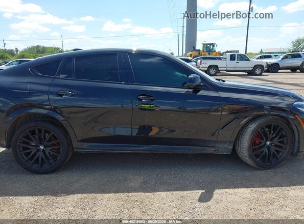 5UXCY6C02N9M28402 2022 BMW X6 Black Widok wnętrza z tyłu