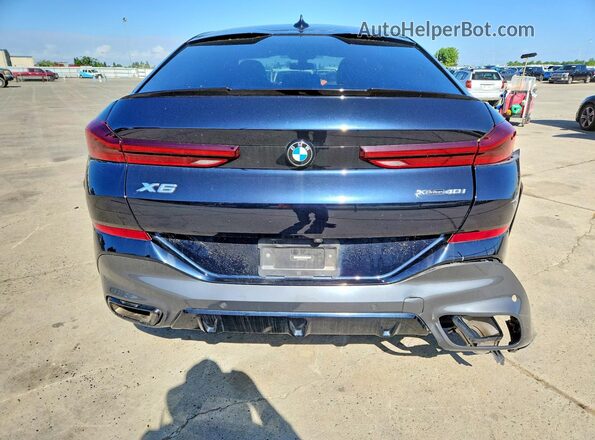 5UXCY6C06P9N71775 2023 BMW X6 Black Vista trasera