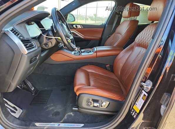 5UXCY6C06P9N71775 2023 BMW X6 Black Vista interior delantera