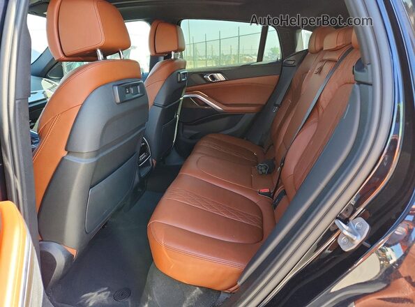 5UXCY6C06P9N71775 2023 BMW X6 Black Vista interior trasera