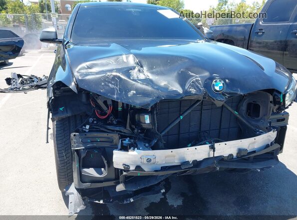 5UXCY8C01P9P14241 2023 BMW X6 Black Front view