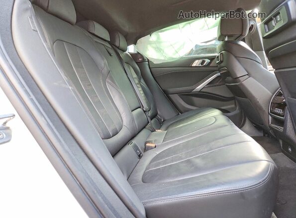 5UXCY8C07L9B64492 2020 BMW X6 Белый Вид задней части салона