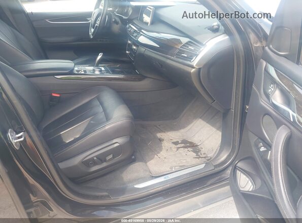 5UXKT0C53J0W02124 2018 BMW X5 Black Vista interior delantera