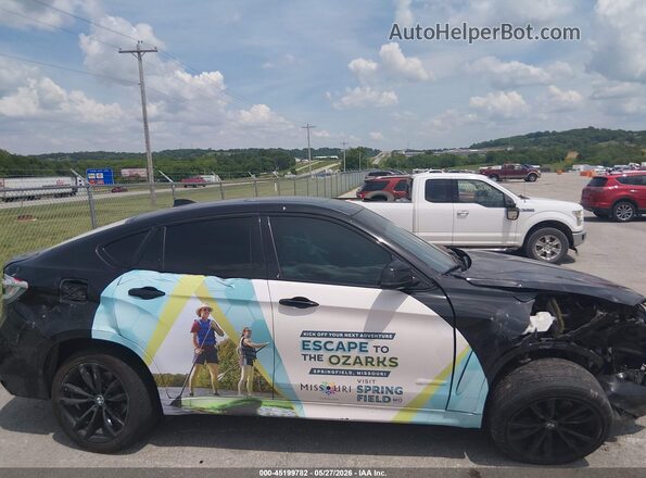 5UXKU2C3XH0X46979 2017 BMW X6 Black Widok wnętrza z tyłu