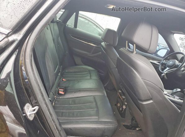 5UXKU2C56J0Z62058 2018 BMW X6 Black Вид задньої частини салону