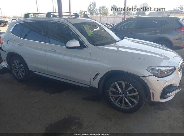 5UXTR7C57KLF27975 2019 BMW X3 White Սալոնի հետևի տեսք