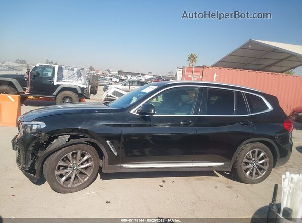 5UXTR7C58KLF32490 2019 BMW X3 Black Սալոնի հետևի տեսք