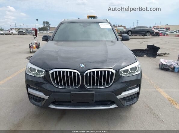 5UXTY3C02M9E60783 2021 BMW X3 Black Widok wnętrza z tyłu
