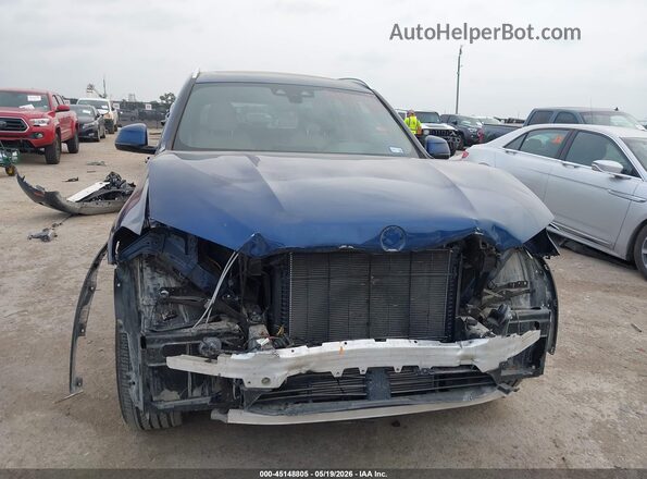 5UXTY3C03M9H85068 2021 BMW X3 Blue Rear interior view