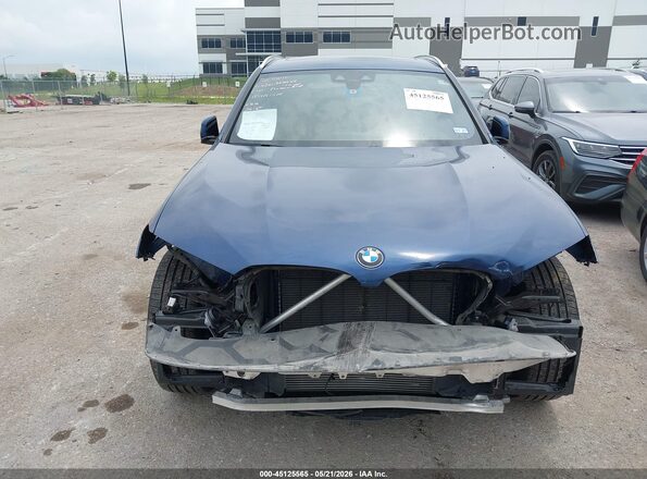 5UXTY3C07L9B31639 2020 BMW X3 Blue Rear interior view