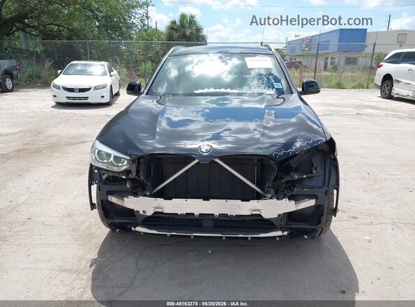 5UXTY3C08M9F36815 2021 BMW X3 Black Вид задньої частини салону