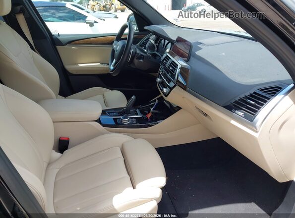 5UXTY3C08M9F36815 2021 BMW X3 Black Вид салону спереду