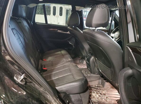 5UXTY5C00M9E39636 2021 BMW X3 Black Vista interior trasera