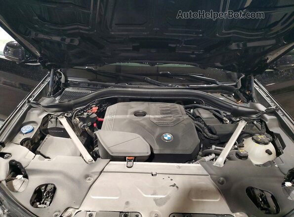 5UXTY5C00M9E39636 2021 BMW X3 Black Vista del compartimento del motor