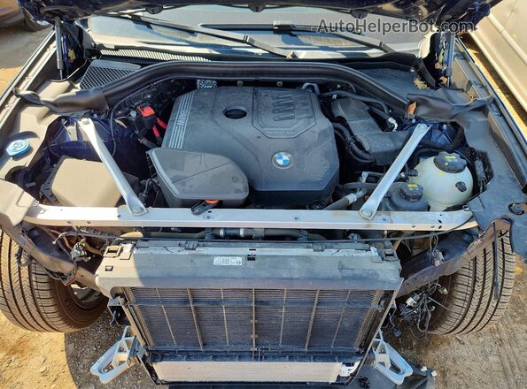 5UXTY5C01M9G50151 2021 BMW X3 Blue Widok wnętrza z tyłu