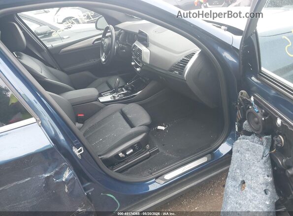 5UXTY5C02M9E07061 2021 BMW X3 Blue Vista interior delantera