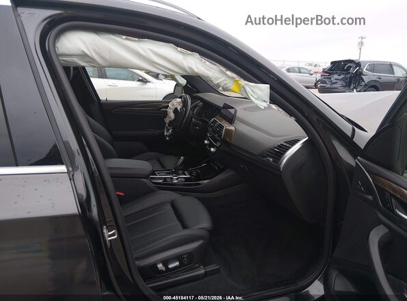 5UXTY5C03M9F57311 2021 BMW X3 Black Widok wnętrza z przodu