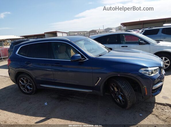 5UXTY5C05LLT34475 2020 BMW X3 Blue Rear interior view