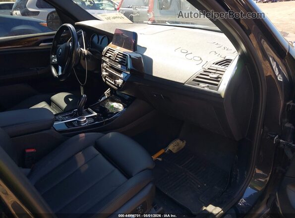 5UXTY5C06M9D71567 2021 BMW X3 Gray Vista interior delantera