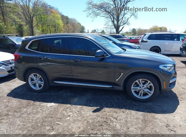 5UXTY5C06M9D71567 2021 BMW X3 Gray Vista interior trasera