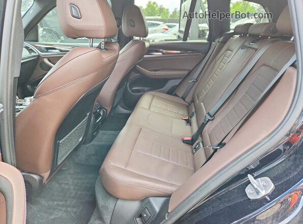 5UXTY9C07LLE59858 2020 BMW X3 Синий Вид задней части салона