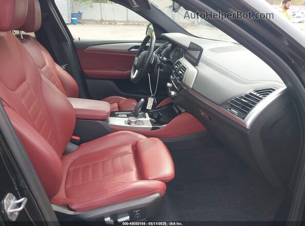 5UXUJ3C52KLA58413 2019 BMW X4 Черный Вид салона спереди