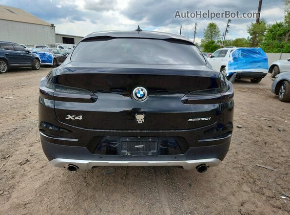 5UXUJ3C58KLG54531 2019 BMW X4 Black Widok z tyłu