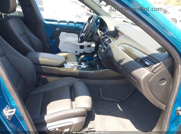 5UXXW7C55J0W64534 2018 BMW X4 Бирюзовый Вид салона спереди