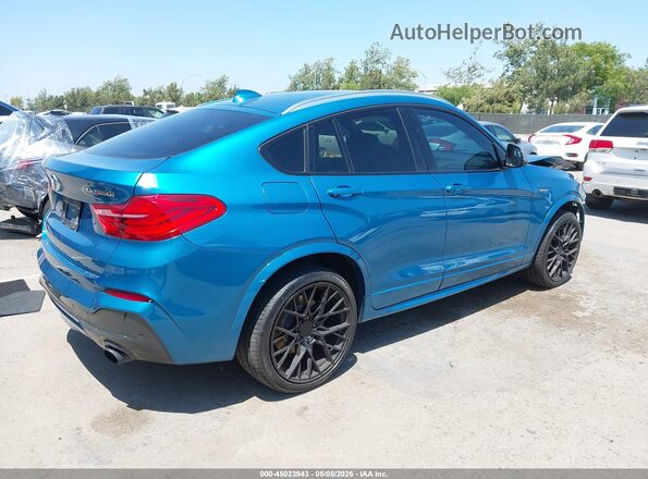 5UXXW7C55J0W64534 2018 BMW X4 Бирюзовый Задняя правая четверть