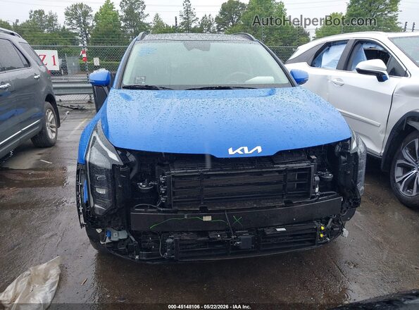 5XYK43DF0TG334671 2026 KIA SPORTAGE Blue Սալոնի հետևի տեսք