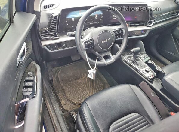 5XYK5CAF3PG023632 2023 KIA SPORTAGE Синий Вид панели приборов