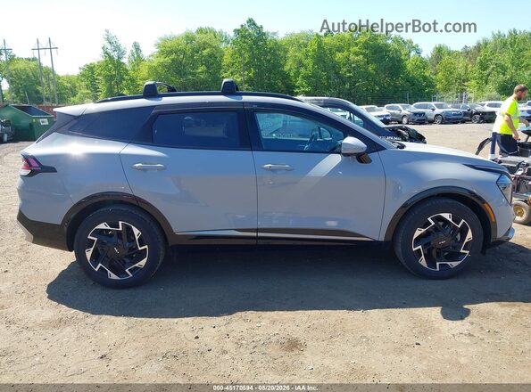 5XYK5CDF4RG159959 2024 KIA SPORTAGE Серый Вид задней части салона