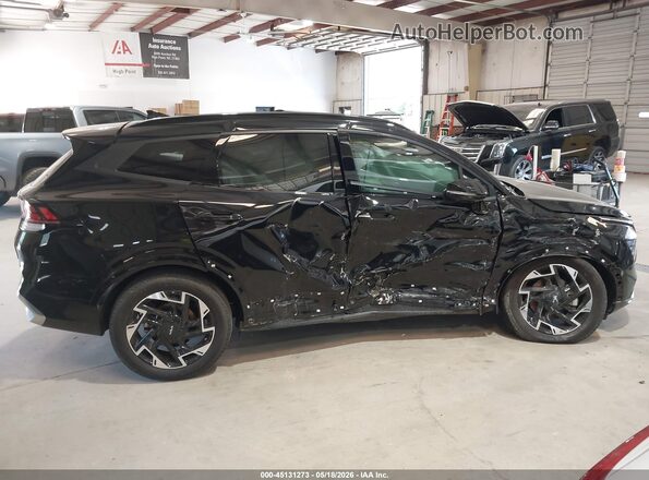 5XYK5CDF9RG145619 2024 KIA SPORTAGE Black უკანა სალონის ხედი