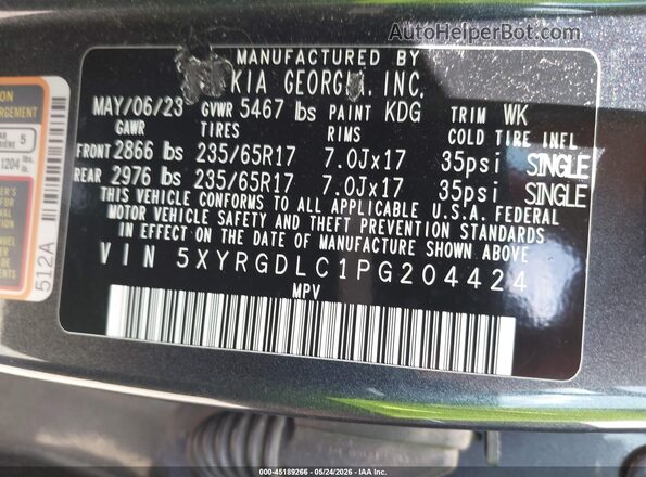 5XYRGDLC1PG204424 2023 KIA SORENTO Gray Vista del compartimento del motor
