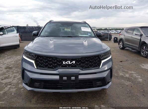 5XYRKDLF9PG224705 2023 KIA SORENTO Gray Սալոնի հետևի տեսք